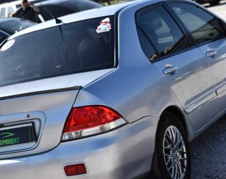 Серый Мицубиси Лансер, объемом двигателя 1.6 л и пробегом 230 тыс. км за 4550 $, фото 3 на Automoto.ua