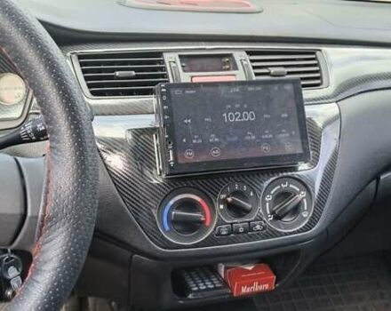 Мицубиси Лансер 2006 в Днепре (Днепропетровске) на Automoto.ua Серый Мицубиси Лансер, объемом двигателя 1.6 л и пробегом 270 тыс. км за 4800 $, фото 4 на Automoto.ua