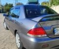 Сірий Міцубісі Lancer, об'ємом двигуна 1.6 л та пробігом 229 тис. км за 4900 $, фото 16 на Automoto.ua