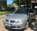 Серый Мицубиси Лансер, объемом двигателя 1.58 л и пробегом 140 тыс. км за 4800 $, фото 1 на Automoto.ua