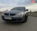 Сірий Міцубісі Lancer, об'ємом двигуна 1.58 л та пробігом 290 тис. км за 3400 $, фото 1 на Automoto.ua