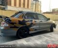 Сірий Міцубісі Lancer, об'ємом двигуна 2 л та пробігом 258 тис. км за 4850 $, фото 4 на Automoto.ua