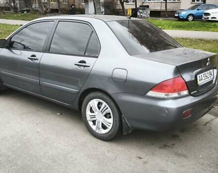 Серый Мицубиси Лансер, объемом двигателя 1.6 л и пробегом 263 тыс. км за 3650 $, фото 5 на Automoto.ua