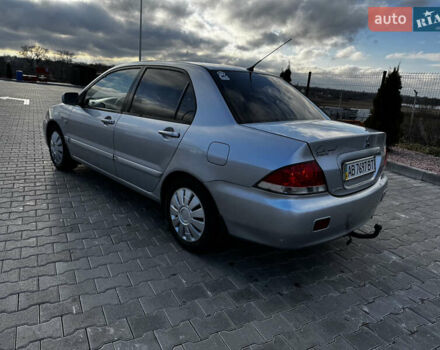 Сірий Міцубісі Lancer, об'ємом двигуна 1.58 л та пробігом 333 тис. км за 2700 $, фото 8 на Automoto.ua