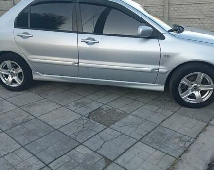 Мицубиси Лансер 2006 в Каменское - Днепродзержинск на Automoto.ua Серый Мицубиси Лансер, объемом двигателя 1.58 л и пробегом 238 тыс. км за 5400 $, фото 9 на Automoto.ua