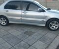Мицубиси Лансер 2006 в Каменское - Днепродзержинск на Automoto.ua Серый Мицубиси Лансер, объемом двигателя 1.58 л и пробегом 238 тыс. км за 5400 $, фото 9 на Automoto.ua