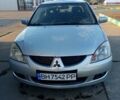 Сірий Міцубісі Lancer, об'ємом двигуна 1.6 л та пробігом 36 тис. км за 3500 $, фото 1 на Automoto.ua