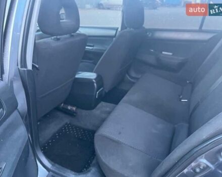 Серый Мицубиси Лансер, объемом двигателя 1.6 л и пробегом 279 тыс. км за 3990 $, фото 11 на Automoto.ua