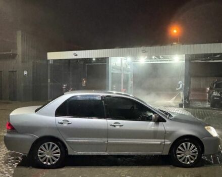 Серый Мицубиси Лансер, объемом двигателя 1.6 л и пробегом 330 тыс. км за 3200 $, фото 4 на Automoto.ua