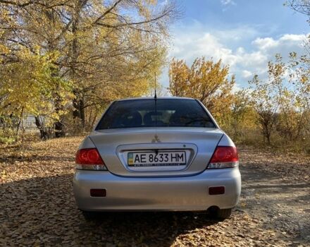 Серый Мицубиси Лансер, объемом двигателя 1.6 л и пробегом 204 тыс. км за 3999 $, фото 2 на Automoto.ua