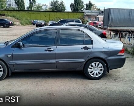 Серый Мицубиси Лансер, объемом двигателя 1.6 л и пробегом 275 тыс. км за 4700 $, фото 1 на Automoto.ua