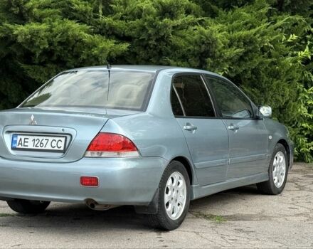 Серый Мицубиси Лансер, объемом двигателя 1.6 л и пробегом 220 тыс. км за 4400 $, фото 6 на Automoto.ua