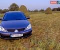 Серый Мицубиси Лансер, объемом двигателя 1.59 л и пробегом 107 тыс. км за 5999 $, фото 1 на Automoto.ua