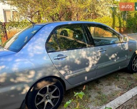 Сірий Міцубісі Lancer, об'ємом двигуна 1.6 л та пробігом 36 тис. км за 3500 $, фото 3 на Automoto.ua