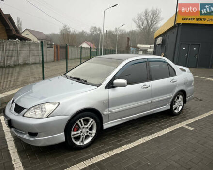 Сірий Міцубісі Lancer, об'ємом двигуна 2 л та пробігом 187 тис. км за 4500 $, фото 6 на Automoto.ua