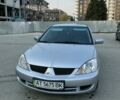 Сірий Міцубісі Lancer, об'ємом двигуна 2 л та пробігом 199 тис. км за 4400 $, фото 1 на Automoto.ua