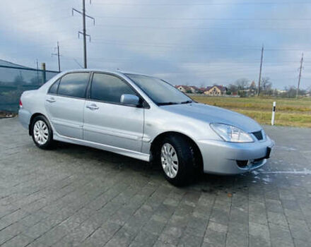 Серый Мицубиси Лансер, объемом двигателя 1.6 л и пробегом 253 тыс. км за 2850 $, фото 7 на Automoto.ua