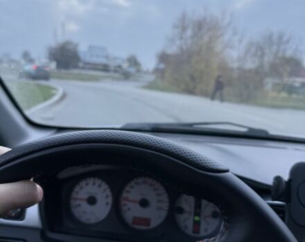 Серый Мицубиси Лансер, объемом двигателя 2 л и пробегом 256 тыс. км за 7000 $, фото 9 на Automoto.ua