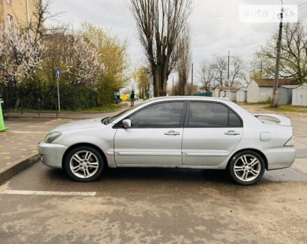 Сірий Міцубісі Lancer, об'ємом двигуна 2 л та пробігом 271 тис. км за 4500 $, фото 7 на Automoto.ua