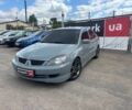 Сірий Міцубісі Lancer, об'ємом двигуна 2 л та пробігом 260 тис. км за 4990 $, фото 1 на Automoto.ua