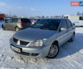 Сірий Міцубісі Lancer, об'ємом двигуна 1.6 л та пробігом 261 тис. км за 5100 $, фото 1 на Automoto.ua