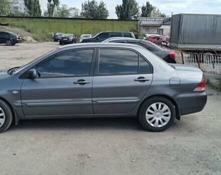 Мицубиси Лансер 2006 в Днепре (Днепропетровске) на Automoto.ua Серый Мицубиси Лансер, объемом двигателя 1.6 л и пробегом 270 тыс. км за 4800 $, фото 5 на Automoto.ua
