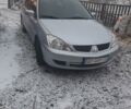 Серый Мицубиси Лансер, объемом двигателя 1.6 л и пробегом 193 тыс. км за 5200 $, фото 1 на Automoto.ua