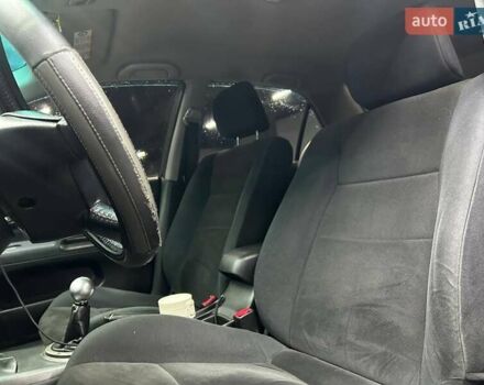 Серый Мицубиси Лансер, объемом двигателя 1.58 л и пробегом 300 тыс. км за 4600 $, фото 6 на Automoto.ua