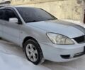 Сірий Міцубісі Lancer, об'ємом двигуна 1.6 л та пробігом 240 тис. км за 5500 $, фото 1 на Automoto.ua