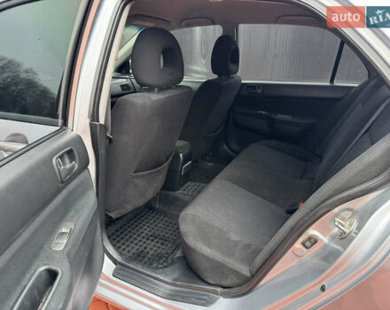 Серый Мицубиси Лансер, объемом двигателя 1.6 л и пробегом 242 тыс. км за 4300 $, фото 11 на Automoto.ua