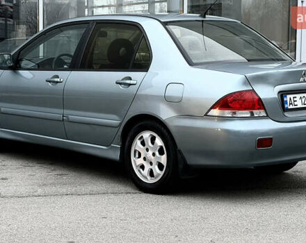 Сірий Міцубісі Lancer, об'ємом двигуна 1.58 л та пробігом 275 тис. км за 4600 $, фото 3 на Automoto.ua