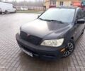 Сірий Міцубісі Lancer, об'ємом двигуна 2 л та пробігом 212 тис. км за 3333 $, фото 1 на Automoto.ua