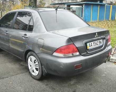 Серый Мицубиси Лансер, объемом двигателя 1.6 л и пробегом 263 тыс. км за 3800 $, фото 11 на Automoto.ua