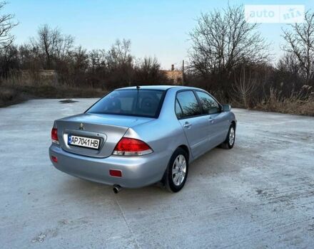 Сірий Міцубісі Lancer, об'ємом двигуна 1.58 л та пробігом 211 тис. км за 4900 $, фото 20 на Automoto.ua