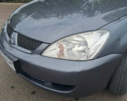 Сірий Міцубісі Lancer, об'ємом двигуна 1.6 л та пробігом 229 тис. км за 4900 $, фото 23 на Automoto.ua