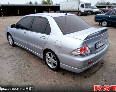 Серый Мицубиси Лансер, объемом двигателя 20 л и пробегом 260 тыс. км за 3200 $, фото 3 на Automoto.ua