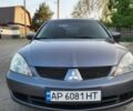 Сірий Міцубісі Lancer, об'ємом двигуна 1.6 л та пробігом 218 тис. км за 5700 $, фото 1 на Automoto.ua