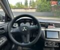 Серый Мицубиси Лансер, объемом двигателя 1.58 л и пробегом 160 тыс. км за 4600 $, фото 13 на Automoto.ua