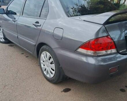Сірий Міцубісі Lancer, об'ємом двигуна 1.6 л та пробігом 229 тис. км за 4900 $, фото 20 на Automoto.ua