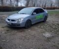 Сірий Міцубісі Lancer, об'ємом двигуна 1.6 л та пробігом 264 тис. км за 3200 $, фото 1 на Automoto.ua
