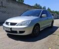 Серый Мицубиси Лансер, объемом двигателя 1.6 л и пробегом 182 тыс. км за 5200 $, фото 1 на Automoto.ua