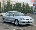 Серый Мицубиси Лансер, объемом двигателя 2 л и пробегом 286 тыс. км за 4600 $, фото 1 на Automoto.ua