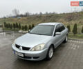 Сірий Міцубісі Lancer, об'ємом двигуна 1.6 л та пробігом 223 тис. км за 3900 $, фото 1 на Automoto.ua