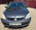 Сірий Міцубісі Lancer, об'ємом двигуна 1.6 л та пробігом 165 тис. км за 4302 $, фото 1 на Automoto.ua