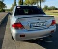 Серый Мицубиси Лансер, объемом двигателя 1.6 л и пробегом 230 тыс. км за 4300 $, фото 7 на Automoto.ua
