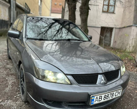 Сірий Міцубісі Lancer, об'ємом двигуна 2 л та пробігом 200 тис. км за 4999 $, фото 2 на Automoto.ua