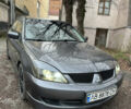Сірий Міцубісі Lancer, об'ємом двигуна 2 л та пробігом 200 тис. км за 4999 $, фото 2 на Automoto.ua