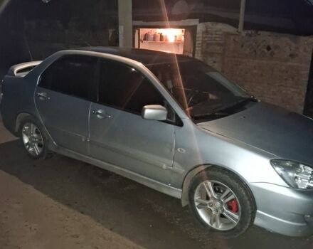 Сірий Міцубісі Lancer, об'ємом двигуна 2 л та пробігом 1000 тис. км за 3600 $, фото 2 на Automoto.ua