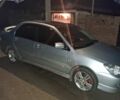 Сірий Міцубісі Lancer, об'ємом двигуна 2 л та пробігом 1000 тис. км за 3600 $, фото 2 на Automoto.ua