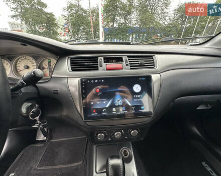 Серый Мицубиси Лансер, объемом двигателя 1.58 л и пробегом 183 тыс. км за 4800 $, фото 20 на Automoto.ua